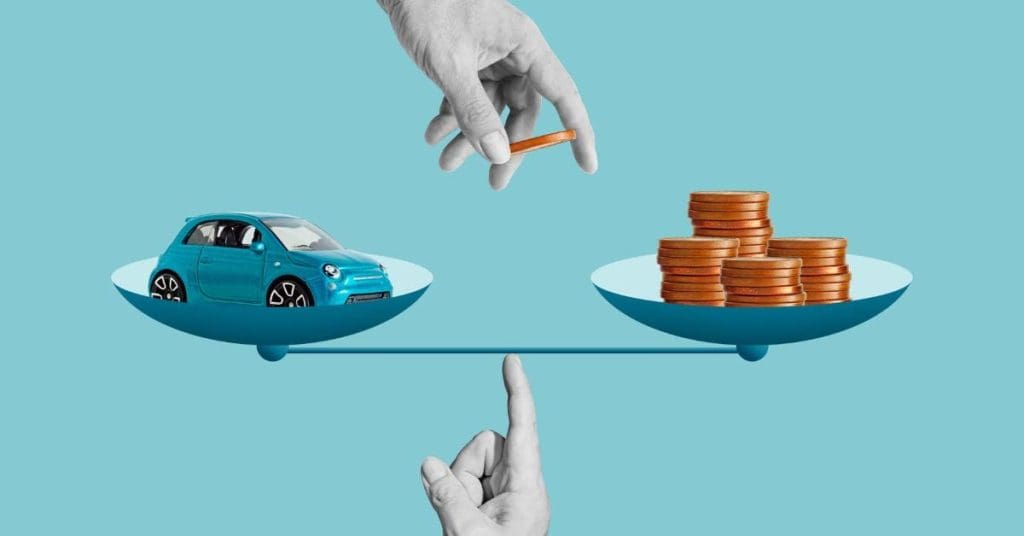 A cartoon drawing of scales with a blue car being balanced against a stack of coins.